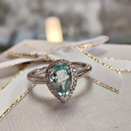 Pear Cut Aquamarine and Diamond Halo Ring